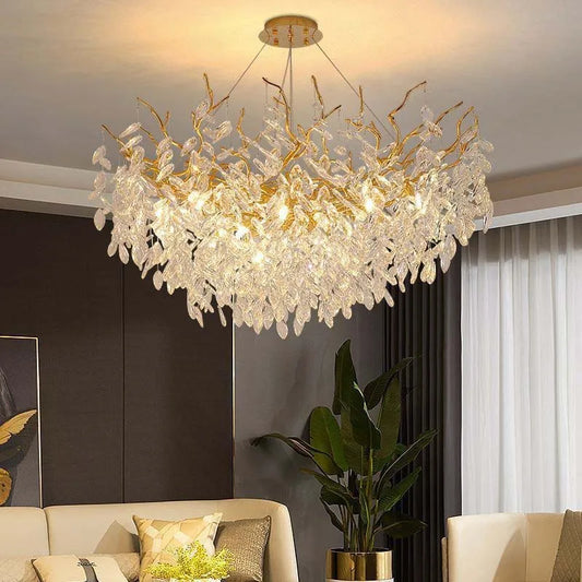 French modern chandelier - luxury crystal ceiling light with gold branch design, illuminating a contemporary living room with elegance.
