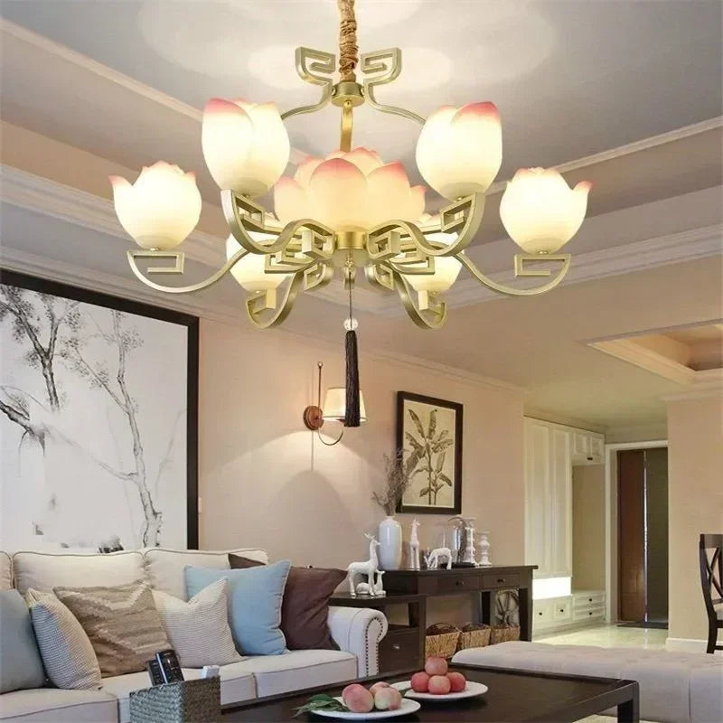 Vintage lotus flower LED pendant light illuminating a modern living room, blending traditional charm with contemporary decor.