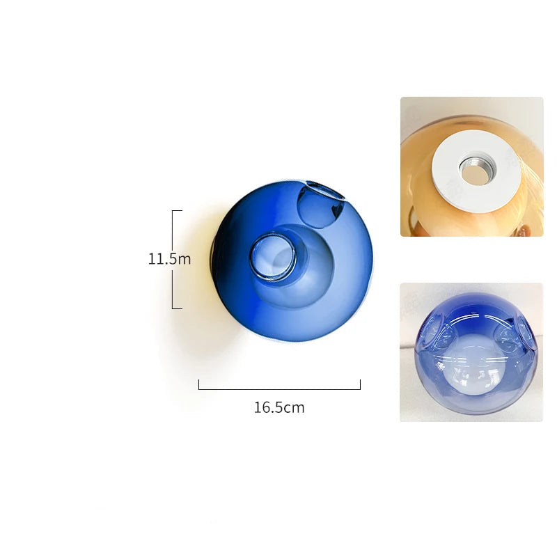 Royal blue glass ball LED wall light with 3W bulb, part of Italian designer collection for modern bedroom or café lighting.