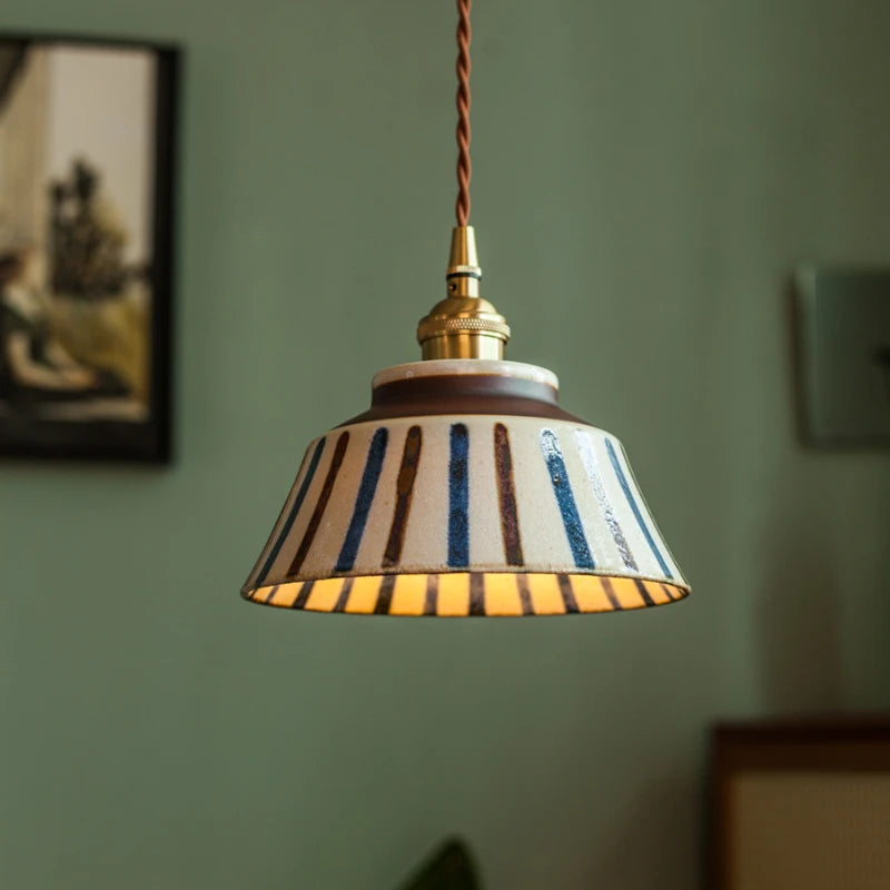 Retro Chinese Porcelain Pendant Light with striped ceramic shade. Brass fixture and twisted cord for classic look.