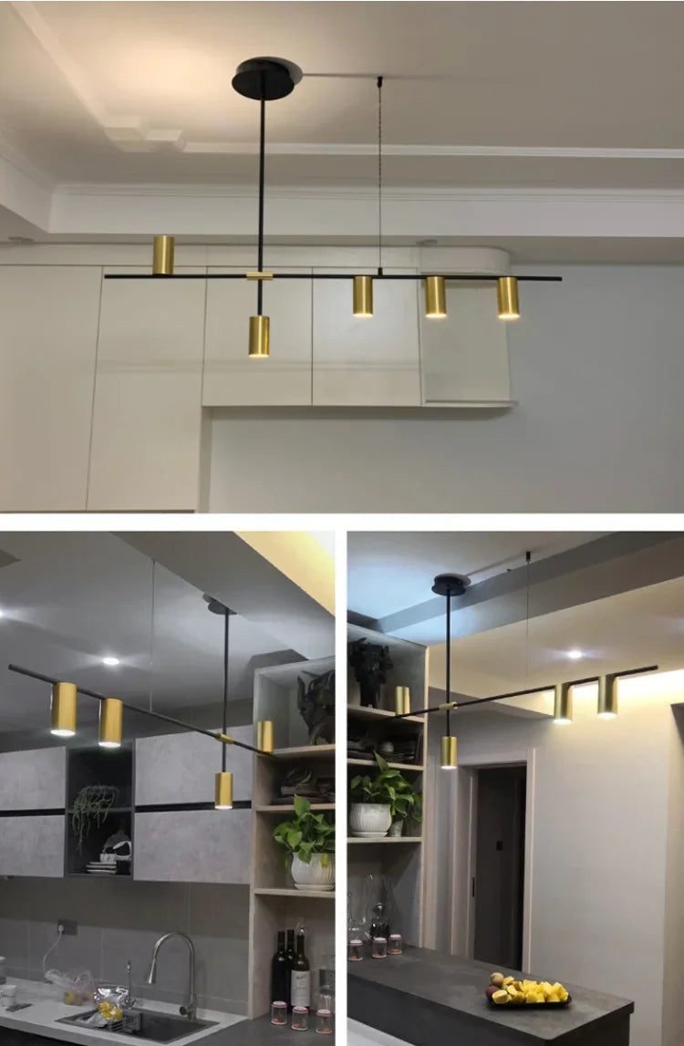 Gold spotlight bar ceiling light installed in a kitchen and hallway, offering modern lighting with a minimalist aesthetic.