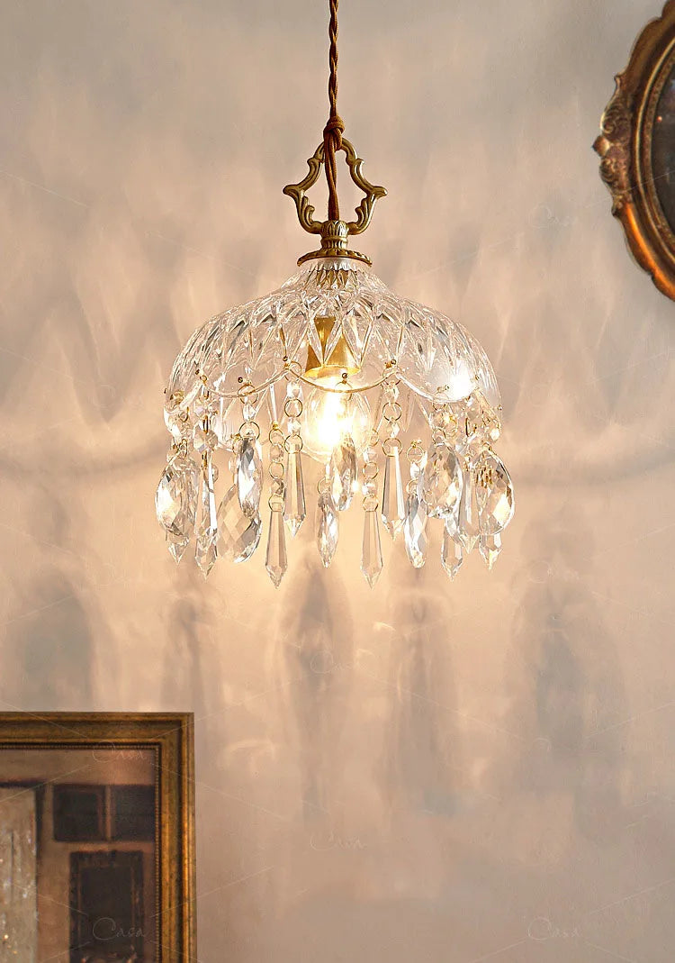 French Vintage Crystal Chandelier - Copper Hanging Lamp casting radiant light patterns on wall, perfect for classic interiors.