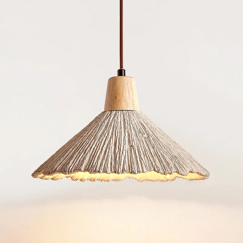 LUXELY designer bedroom travertine pendant light featuring a textured conical shade and warm glow for cozy home ambiance.