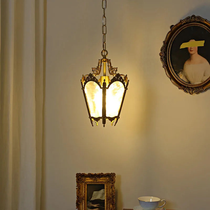 Warm-lit small copper French retro chandelier with ice flower glass, perfect for cozy interiors. LED bulb enhances energy efficiency.
