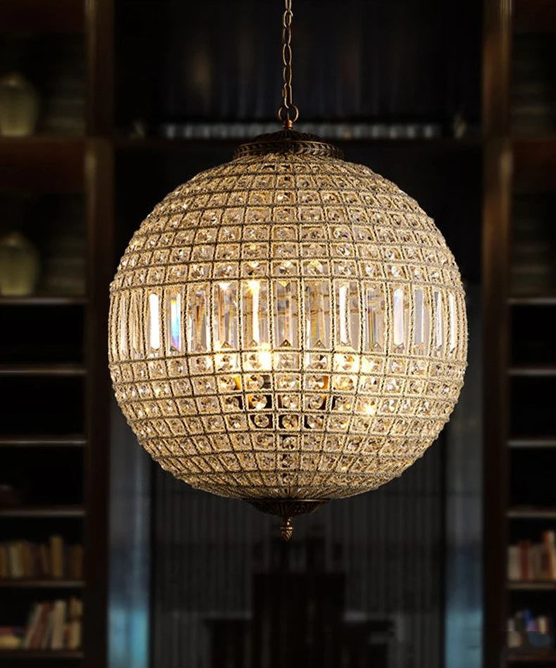 Close-up of Retro Crystal Chandelier with LED lighting in a dark room, showcasing intricate crystal and copper detailing.