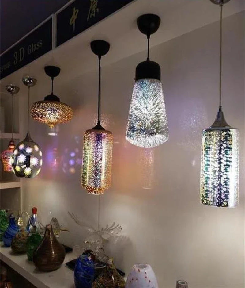 Glass 3D Fireworks Pendant Light - LED Stylish Design in various shapes, displayed in a showroom with decorative glassware.