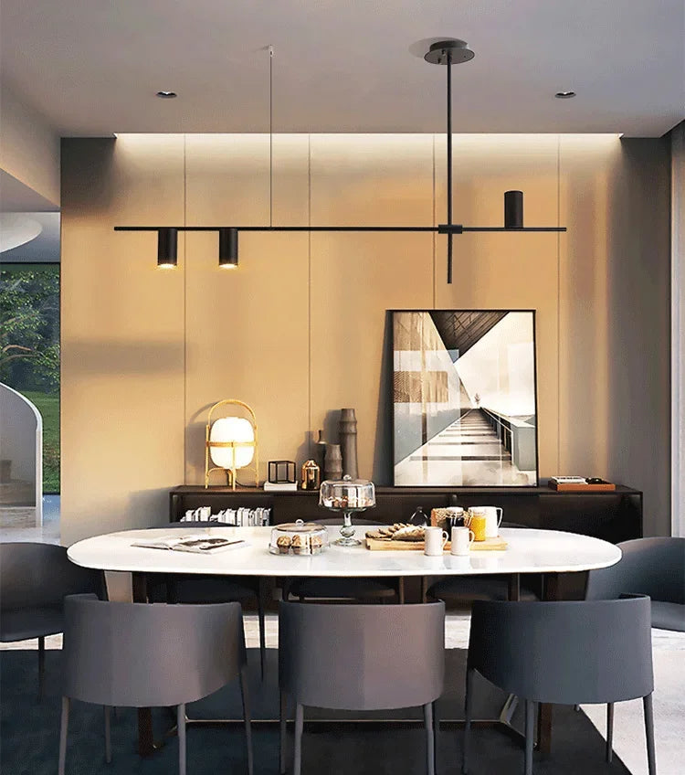 Elegant dining room with black modern minimalist spotlight bar ceiling light, creating a warm ambiance with focused LED lighting.