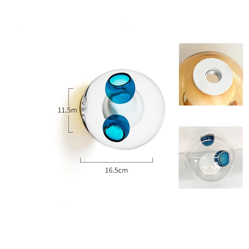 Clear and water blue glass LED wall light with Italian design, adding a vibrant and modern touch to bedroom or café décor.