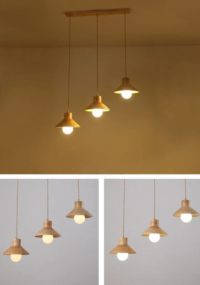 Set of four Nordic wood pendant lights in warm glow, ideal for farmhouse kitchen island or restaurant lighting setup.