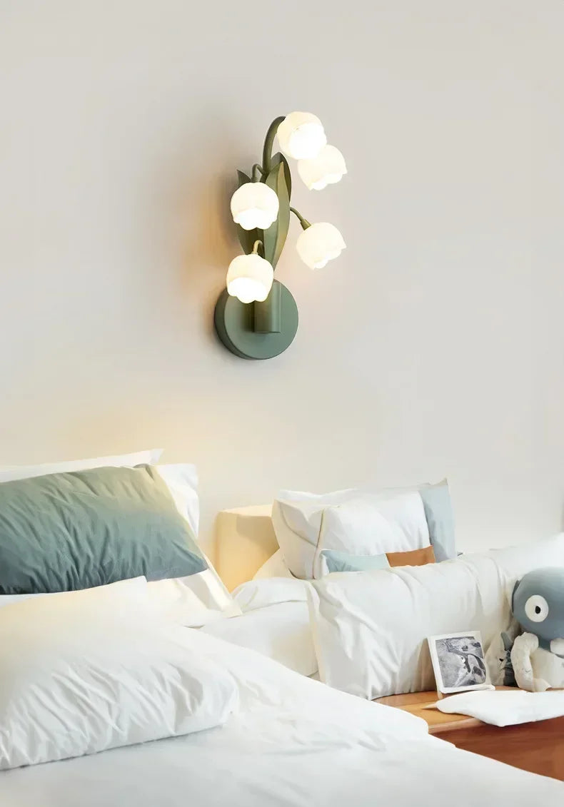 Nordic Atmosphere Wall Lamp above a bed, blending floral LED lighting with minimalist Nordic bedroom design.