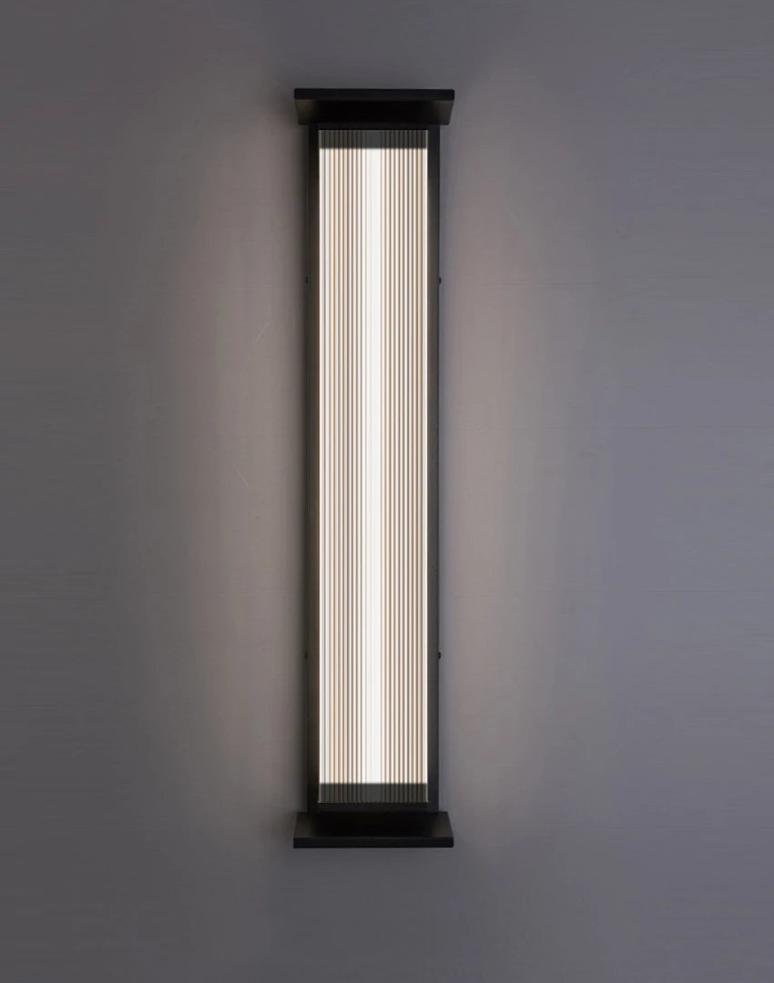 Modern stainless steel wall lamp with neutral white light, IP65 waterproof for outdoor use on walls and fences.