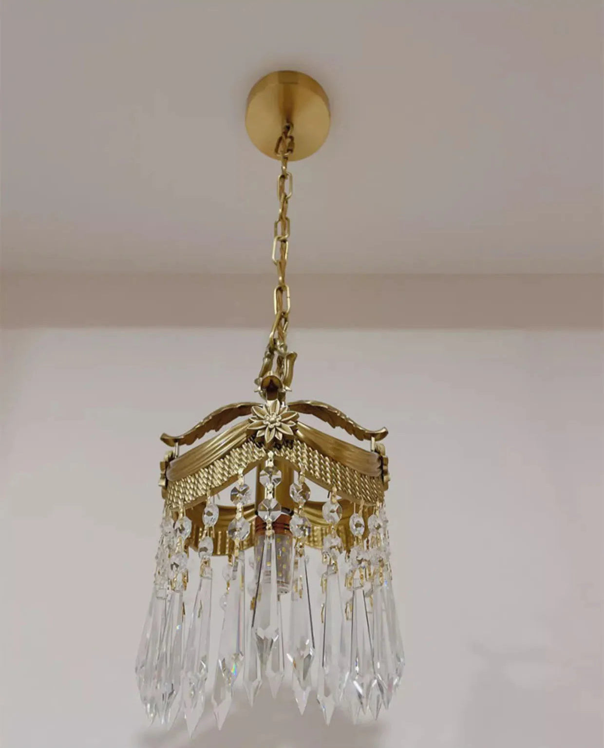 Ceiling-mounted French Velvet Tassel Chandelier with gold canopy and crystal prisms, perfect for elegant interiors.