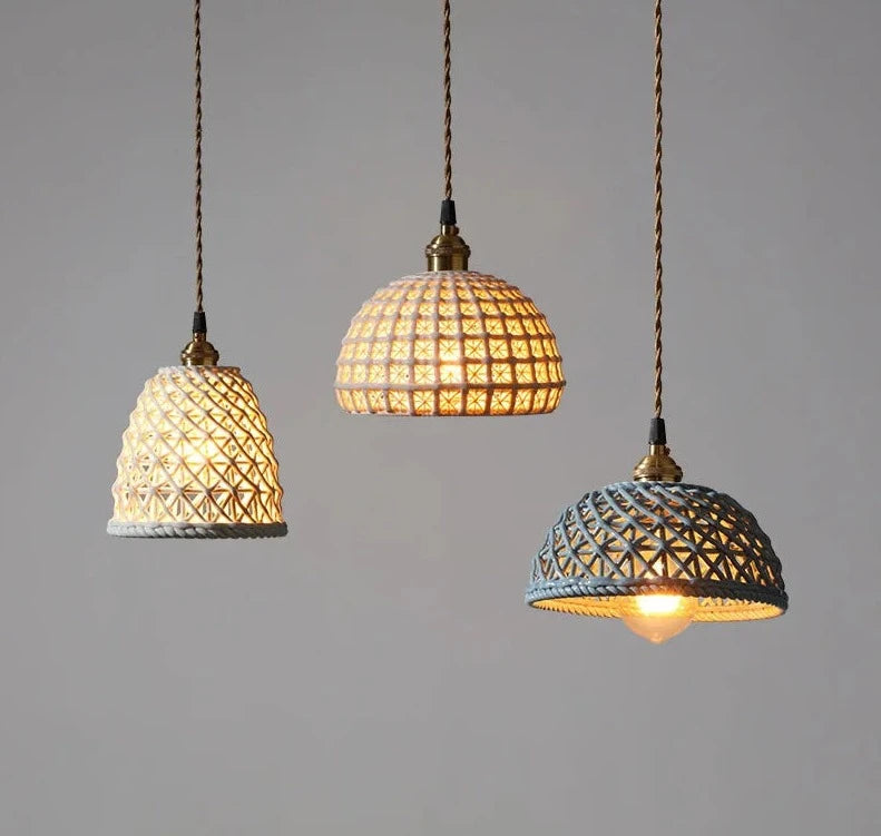 White ceramic LED hanging lamps by LUXELY in a trio arrangement, perfect for modern dining room pendant light setups.