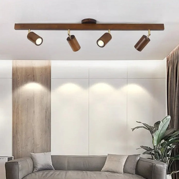 Wood grain LED spotlight by LUXELY installed in a modern living room, enhancing Scandinavian decor with energy-efficient ceiling lighting.