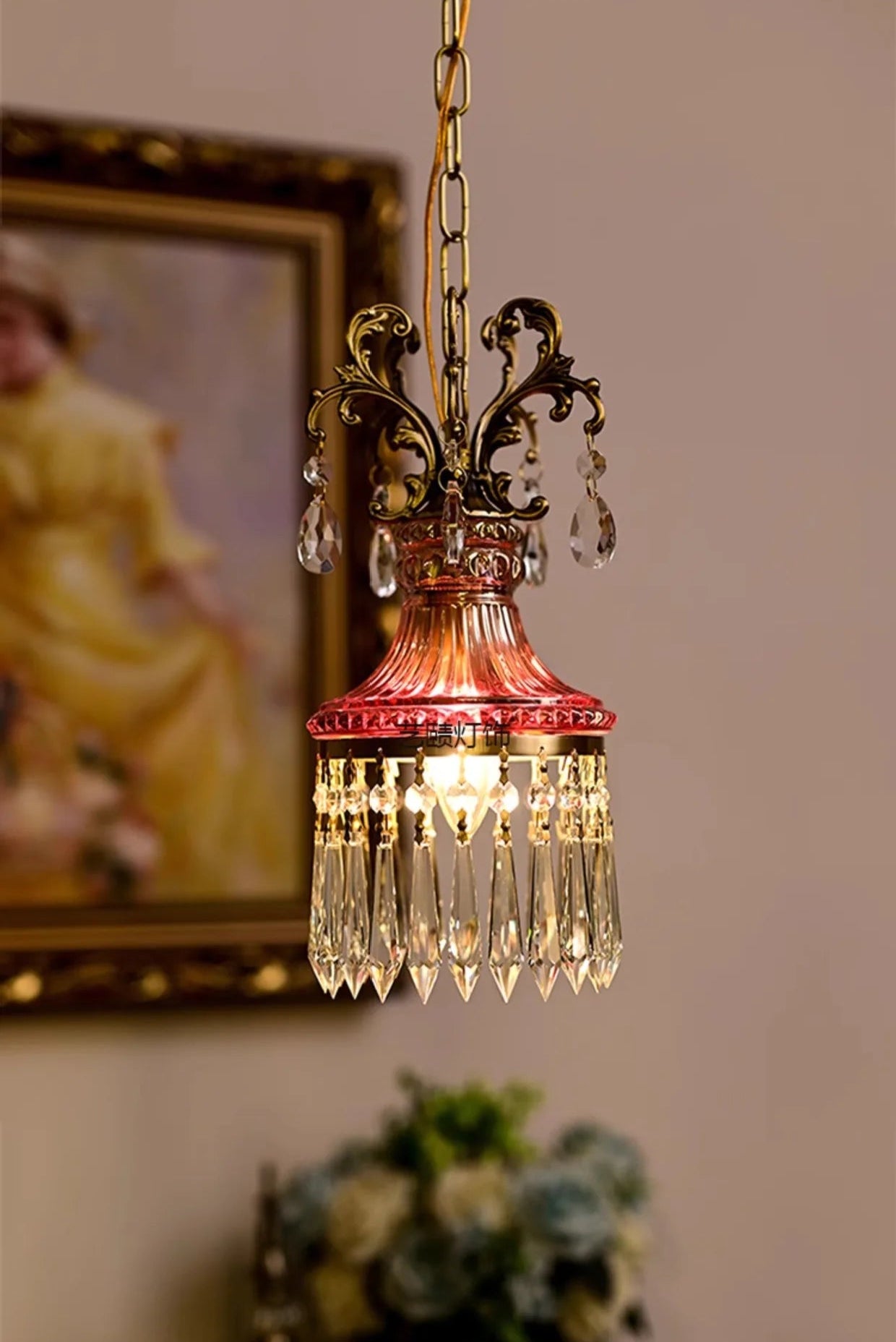 Luxury French crystal chandelier with ornate bronze accents and dimmable pendant light, perfect for vintage-inspired interiors.