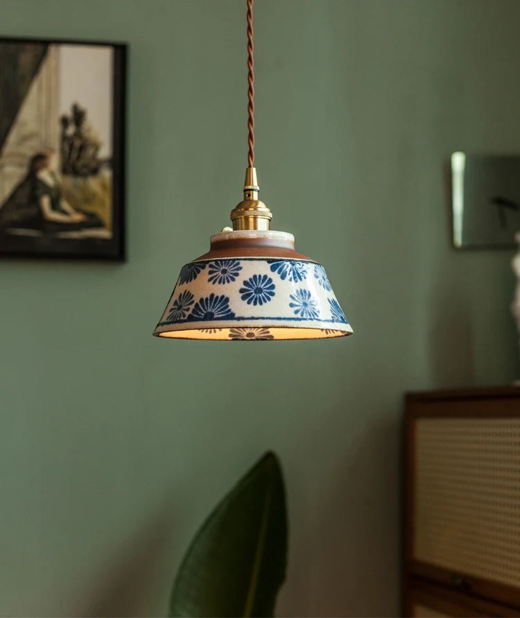 Vintage-style Chinese Porcelain Pendant Light with E27 fitting and floral motif. Enhances traditional or eclectic interiors.