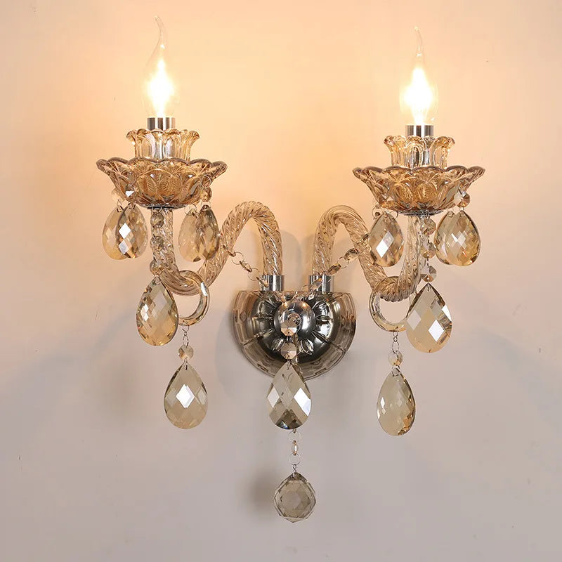 Elegant lotus-shaped vintage wall sconce with exposed LED bulbs and crystal droplets, perfect for classic bedroom or hallway decor.
