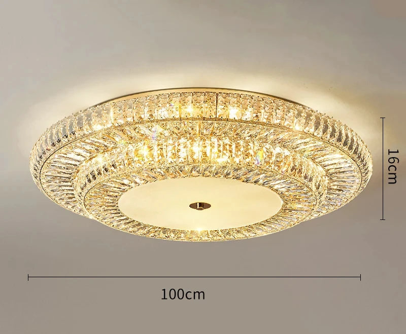 Lampadario da soffitto in cristallo dorato - lampadario rotondo in cristallo con diametro di 100 cm, progettato per ambienti di grandi dimensioni che richiedono un'illuminazione di grande effetto.