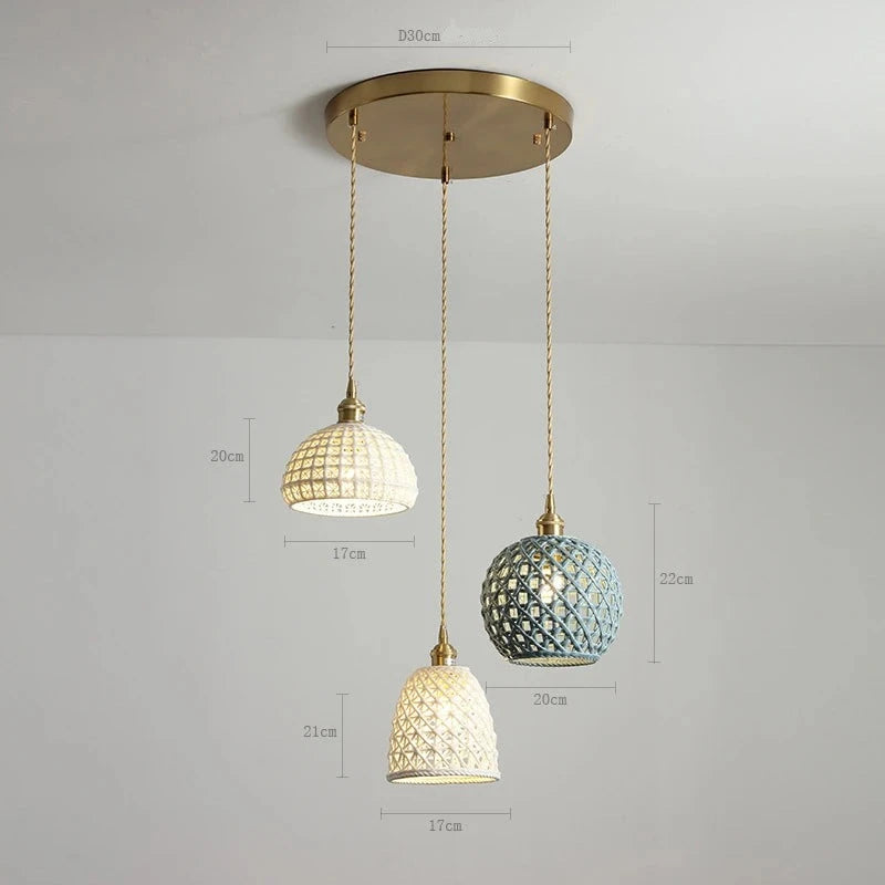 Mixed color LUXELY ceramic pendant lights on round brass ceiling plate, perfect for eclectic dining room or pendant bar lighting.