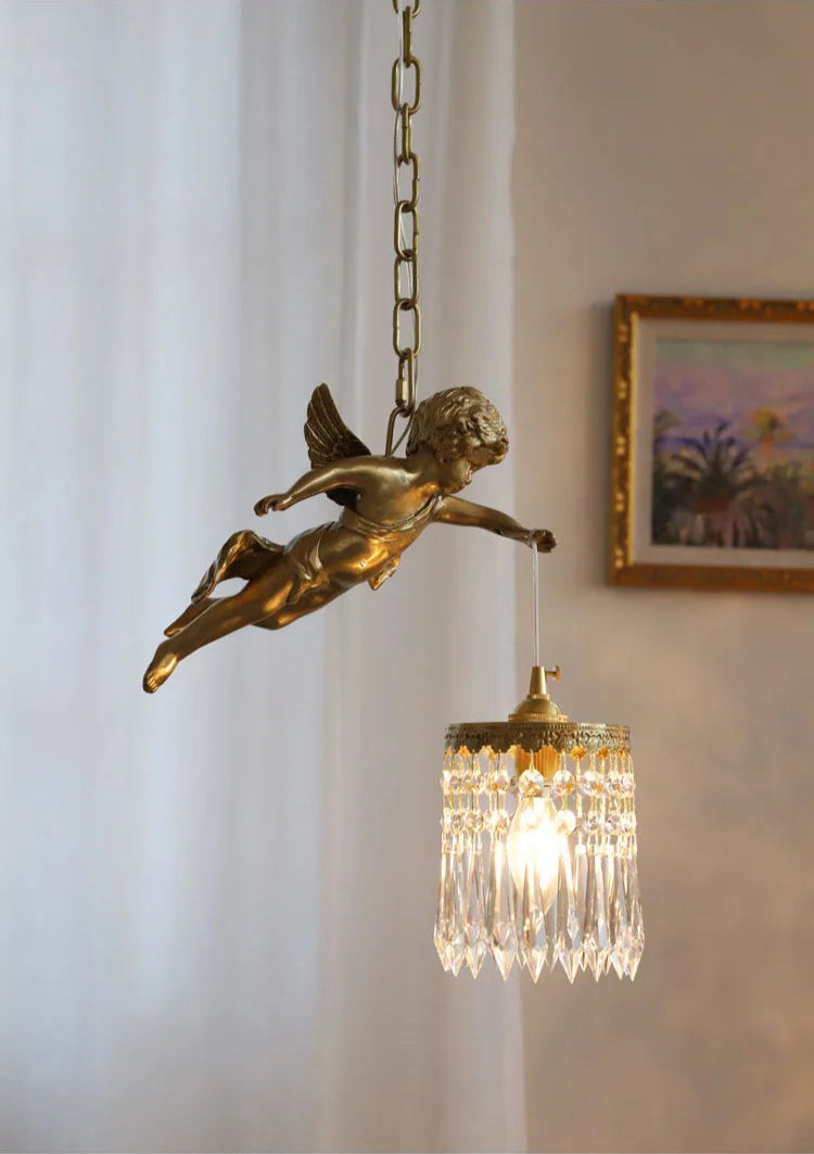 Copper angel chandelier pendant light glowing warmly in a classic interior, ideal for hallways and porches.