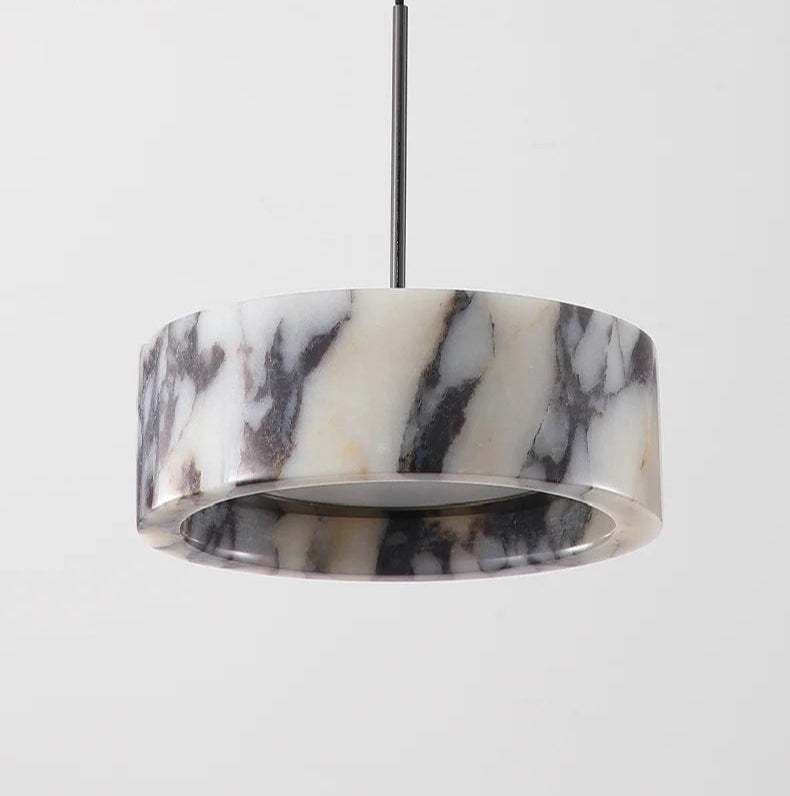 Black Marble Dome Pendant - LED Lamp shown in on and off states, demonstrating its translucent marble glow and stylish design versatility.