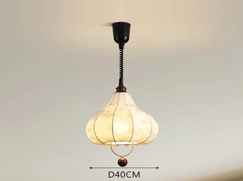 Elegant Nordic Pendant Light with floral cloth shade and wood detailing, perfect for LED lighting in cozy interiors.