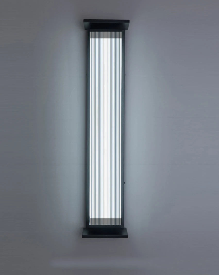 Stainless steel outdoor wall lamp emitting cool white light, perfect for waterproof exterior lighting.