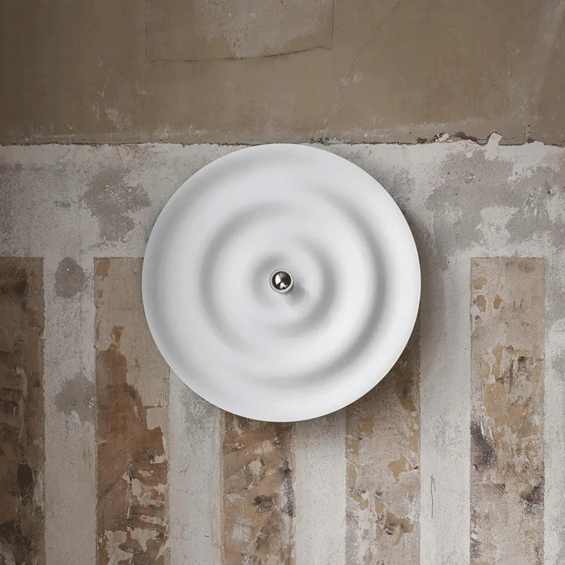 Modern round bedroom sconce