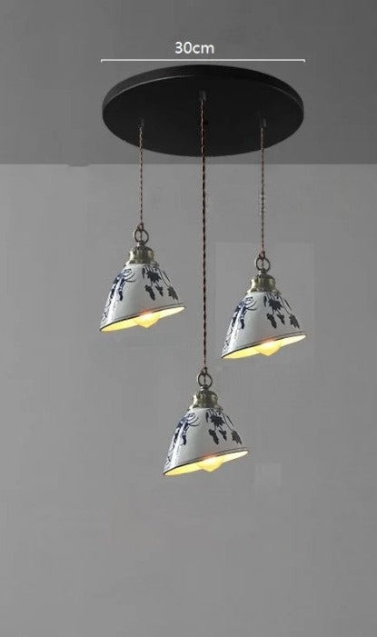 Three blue floral ceramic pendant lights with LED bulbs on a 30cm round base, ideal for farmhouse kitchen lighting.