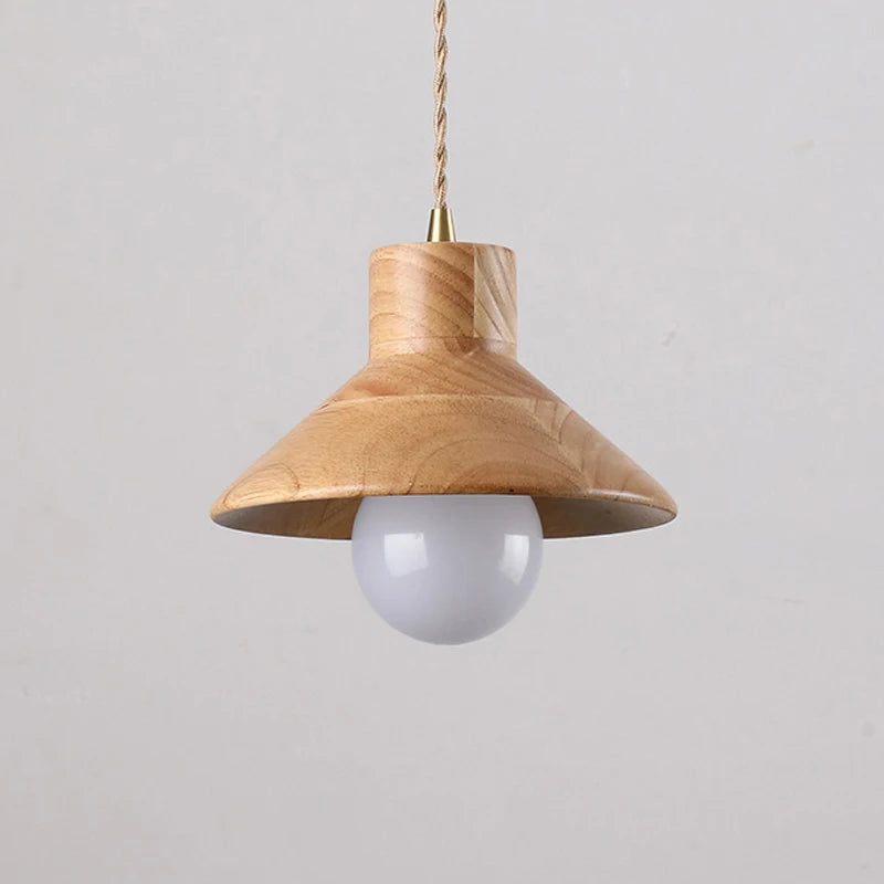 Close-up of Nordic wood pendant light with smooth finish and exposed bulb, ideal for minimalist and modern interiors.