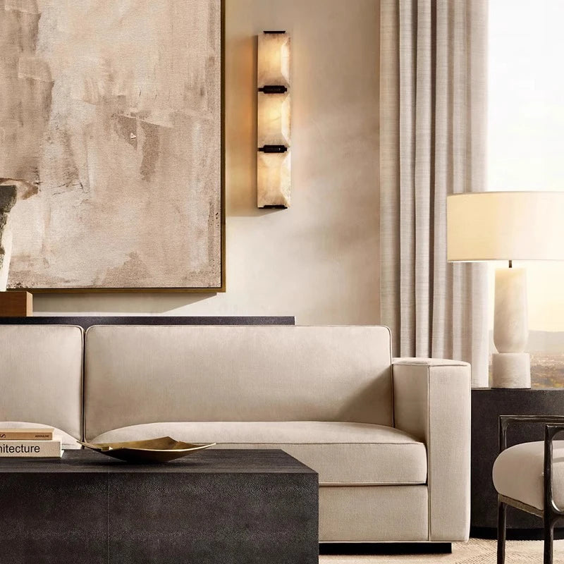 Copper Marble LED Sconce mounted in a living room, blending with neutral tones and modern furniture for elegant wall lighting.