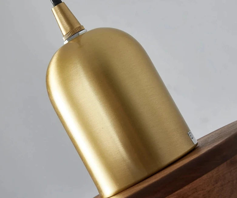 Detailed close-up of the brass dome on LUXELY pendant light, showcasing premium finish and modern craftsmanship.