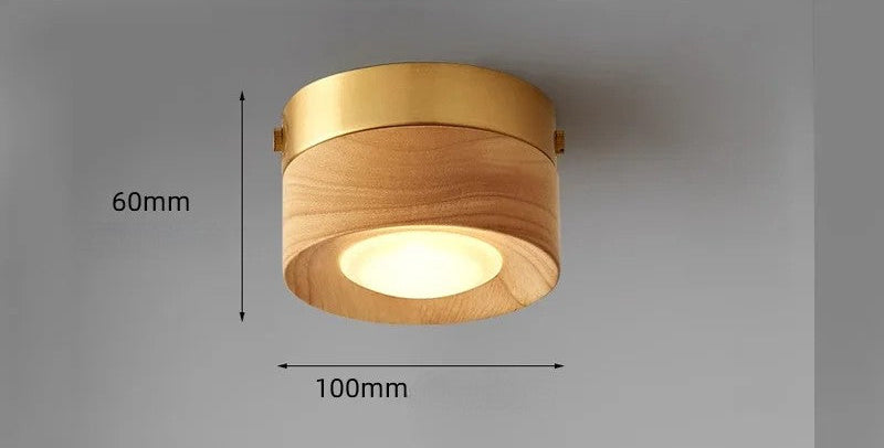 Justerbar downlight i valnötsfärgad mässing för korridor