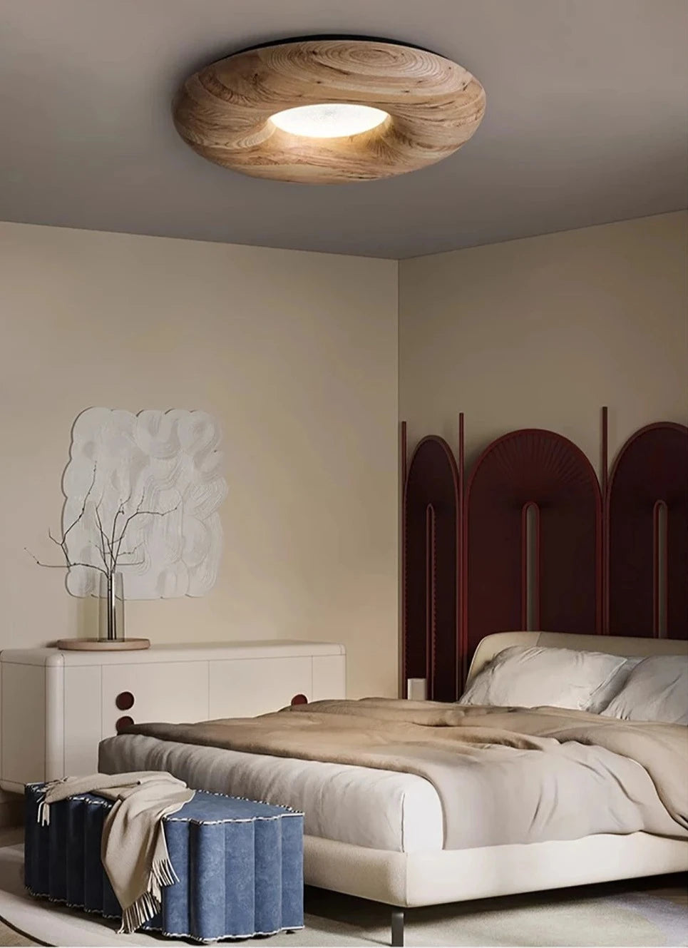 Scandinavian bedroom with light wood LUXELY ceiling light, offering soft LED illumination and modern wooden aesthetics.