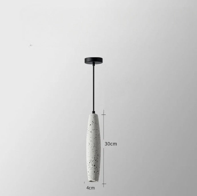 Oval-shaped white LUXELY cement pendant light with LED. Unique industrial design for modern home or restaurant lighting.