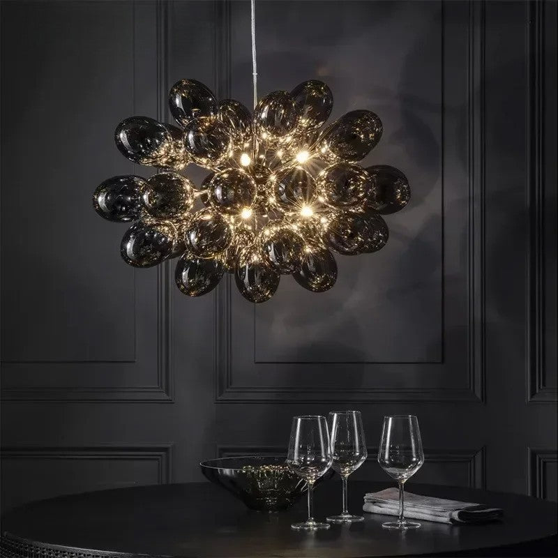 Modern grape glass chandelier with dark smoked glass globes, ideal for dining rooms or modern interiors. Features LED lighting for energy efficiency.