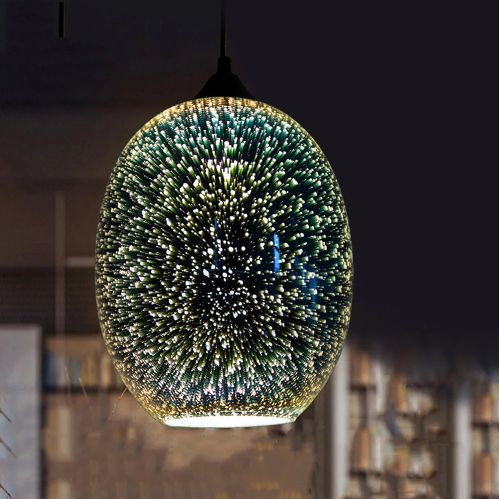Modern 3D fireworks effect pendant light glowing in a dark room, showcasing its vibrant glass sphere design for contemporary interiors.