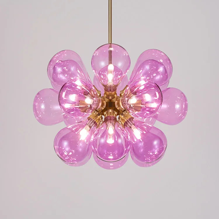 Purple bubble glass chandelier with gold accents, a Nordic design pendant light for bold and stylish interiors.