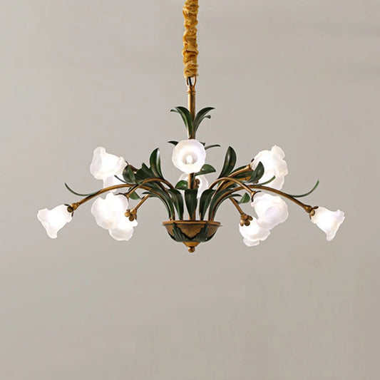 French Floral LED Pendant Light with white glass flower shades and green leaves, ideal for romantic wedding dress shops or vintage interiors.