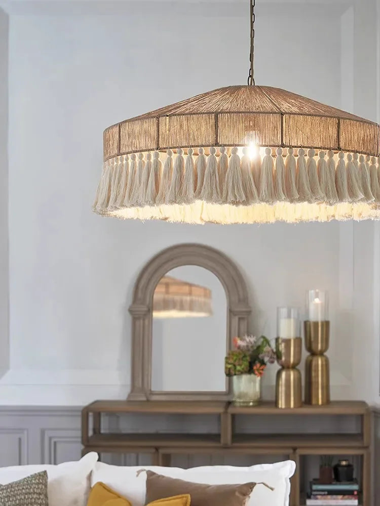 VIGOUS Handmade Ceiling Lamp with cotton tassels, suspended in a stylish room with neutral tones and gold accents.