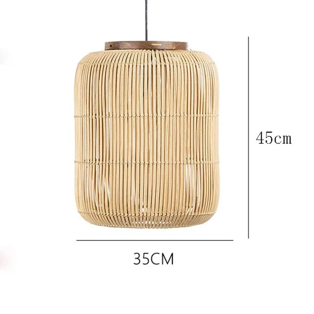 Medium cylindrical rattan pendant light with wood accent, 45cm tall, perfect for dining or living room ceiling installations.