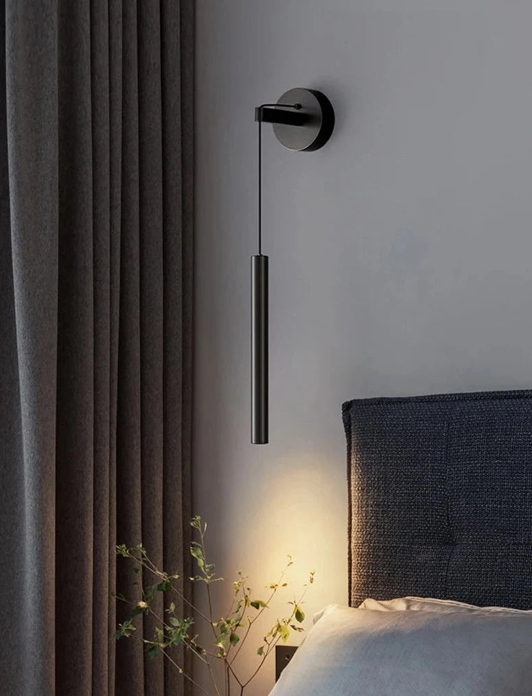 Adjustable bedside sconce