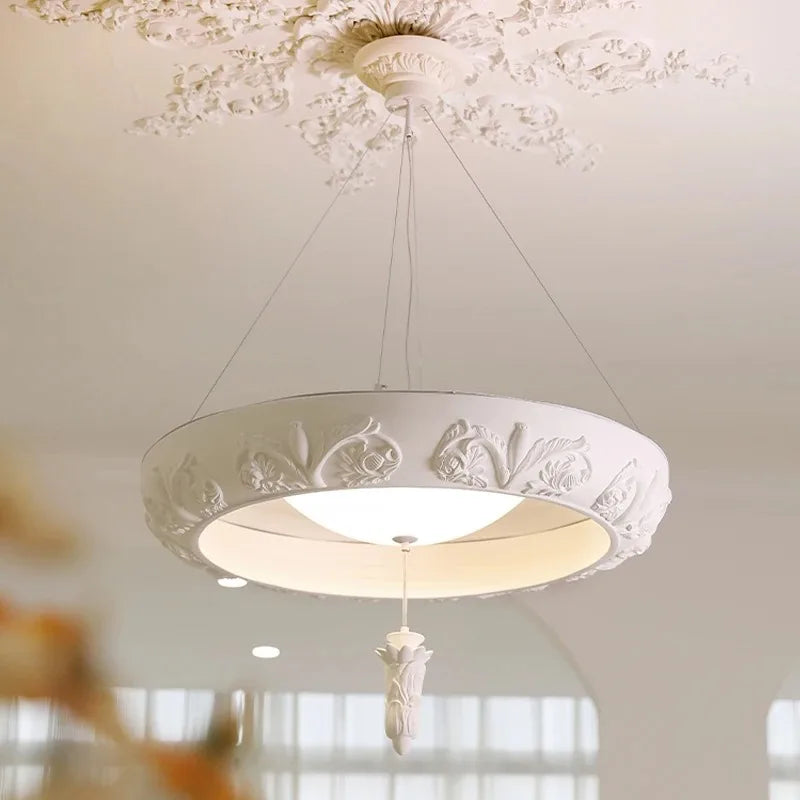 Elegant carved plaster chandelier - french farmhouse ceiling light with floral relief and pendant detail, perfect for classic decor.