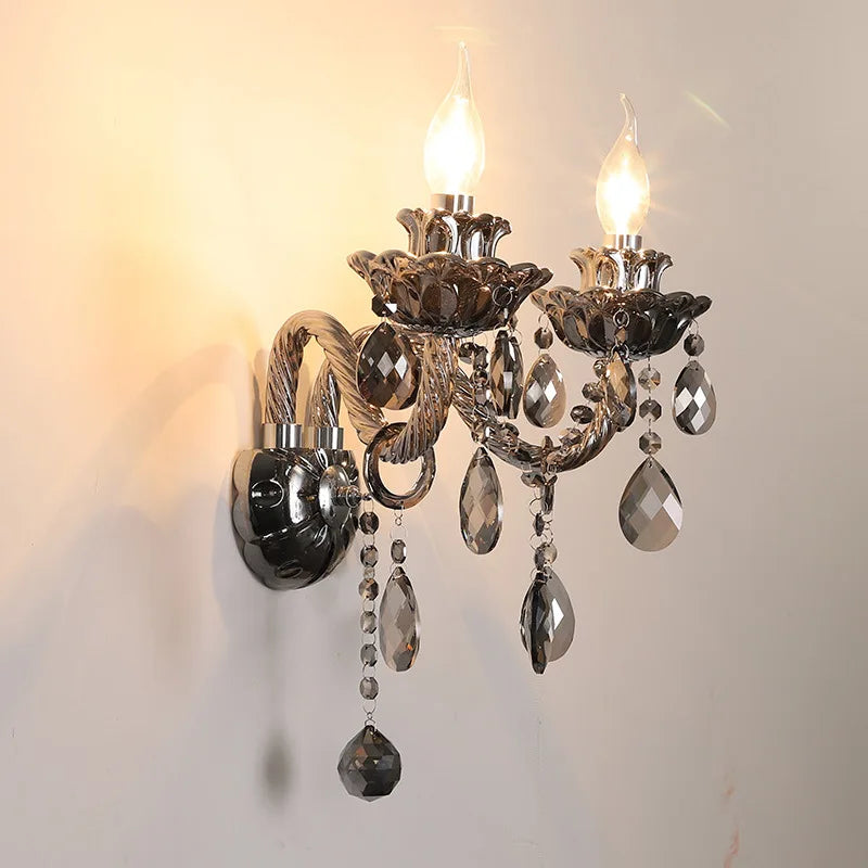 Side view of vintage lotus crystal wall lamp in dark chrome finish with LED bulbs and hanging crystals, ideal for home interiors.