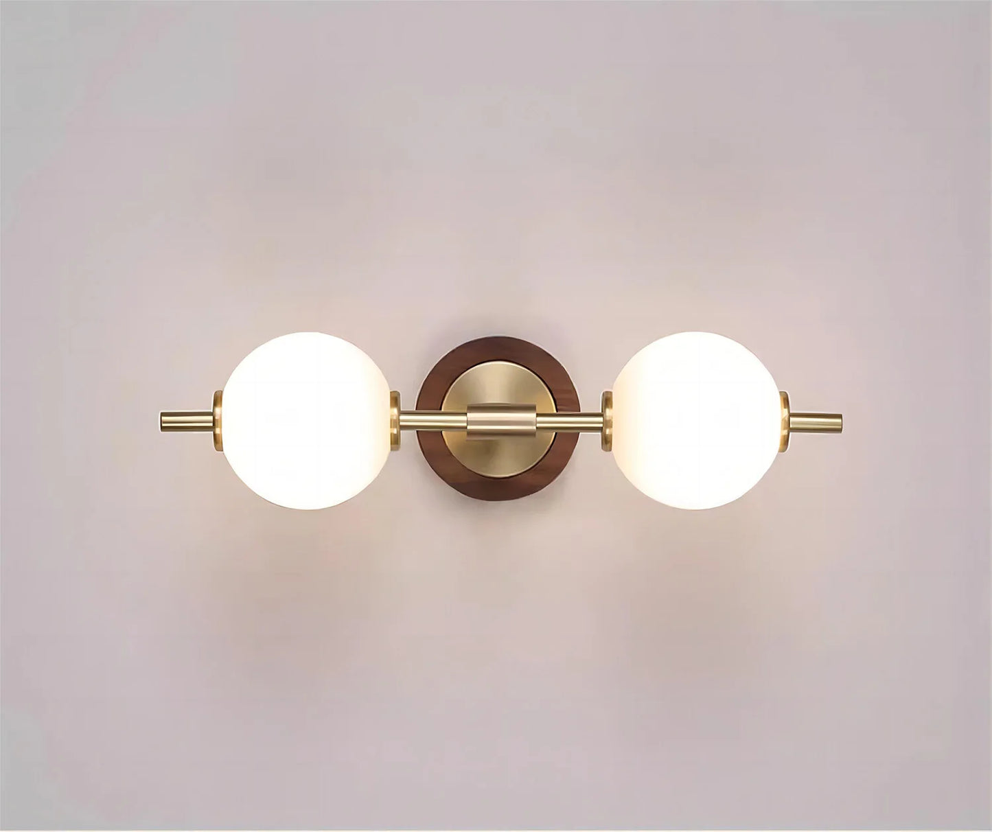 Horizontal LUXELY brass wall lamp with dual frosted globes, perfect for modern home and garden lighting.