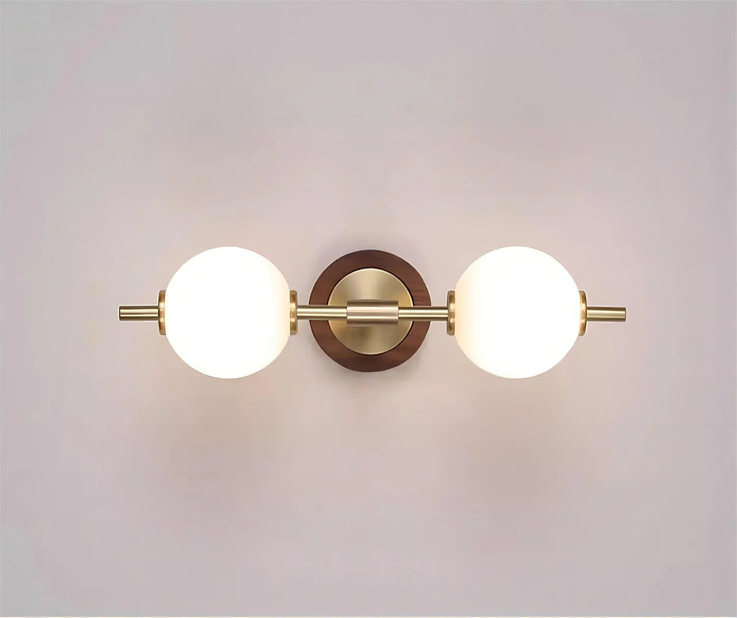 Horizontal LUXELY brass wall lamp with dual frosted globes, perfect for modern home and garden lighting.