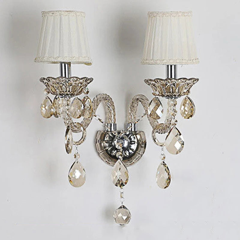 Vintage lotus crystal wall lamp with pleated fabric shades and amber crystal accents, perfect for bedroom or corridor decor.