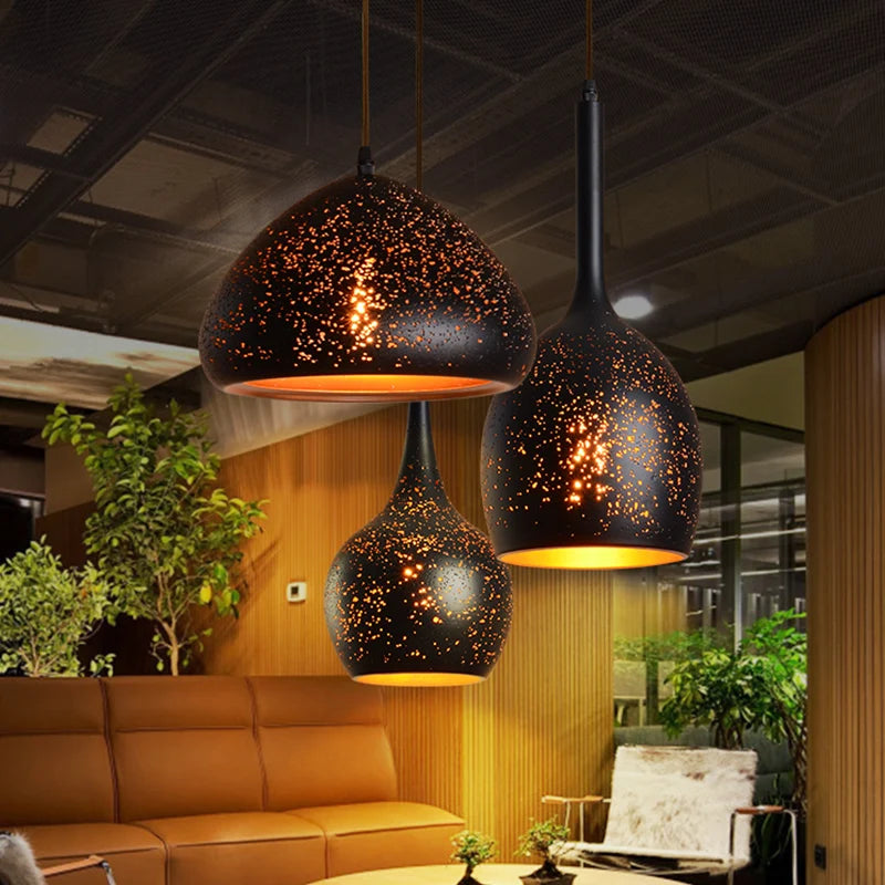 Retro Industrial Black Chandelier trio pendant lights illuminating a modern lounge, perfect for dining rooms, kitchen islands, or bar areas.