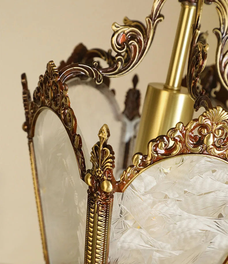 Full view of French retro chandelier with chain mount and LED bulb. Ideal for small rooms with vintage décor.