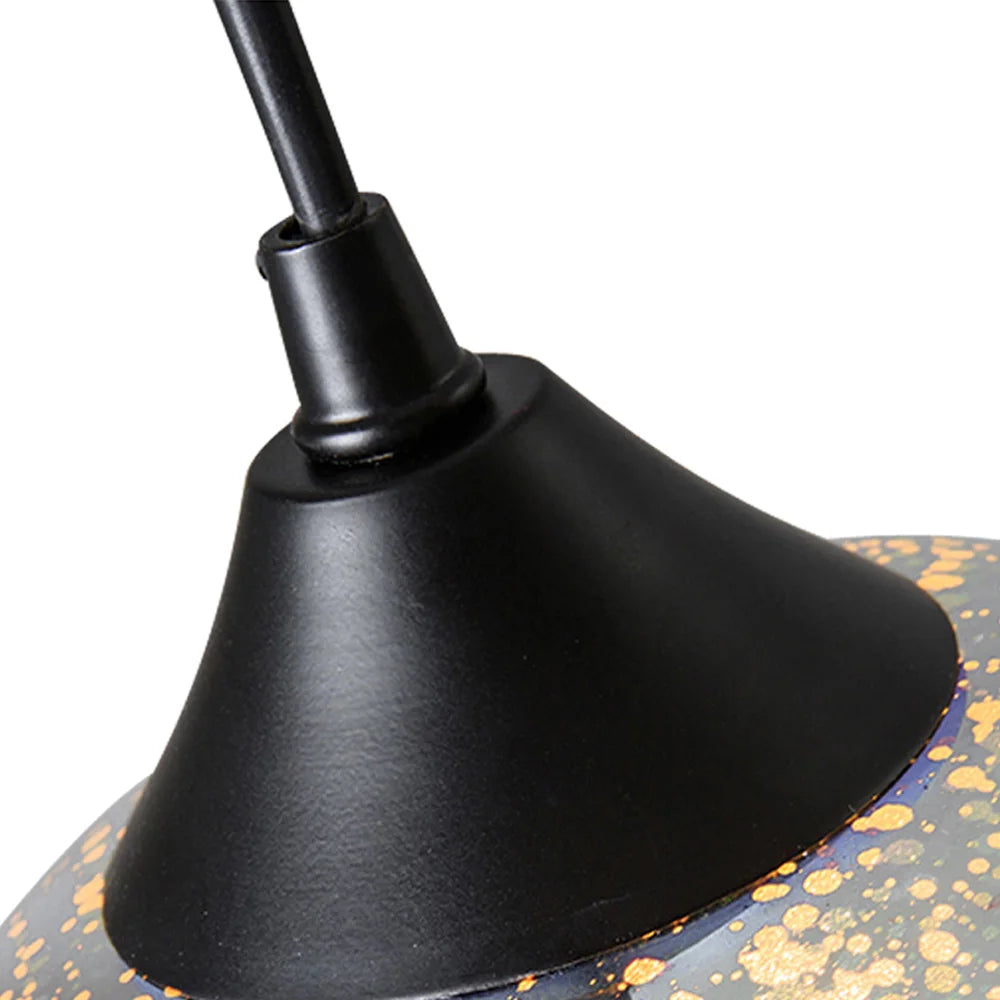 Zoomed-in image of the pendant light’s black ceiling cap and cord connection, part of the modern 3D fireworks light fixture.